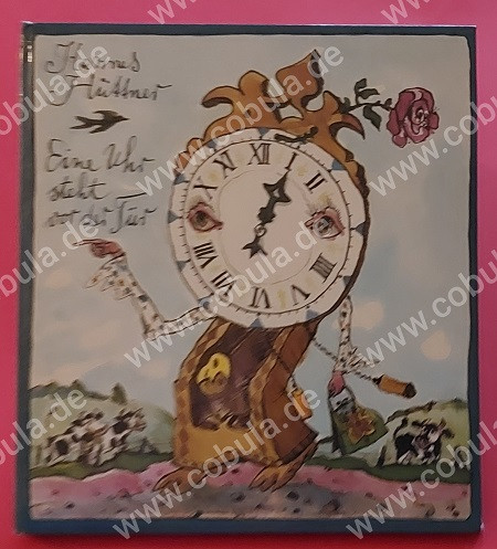 Eine Uhr steht vor der Tür mit Beilage